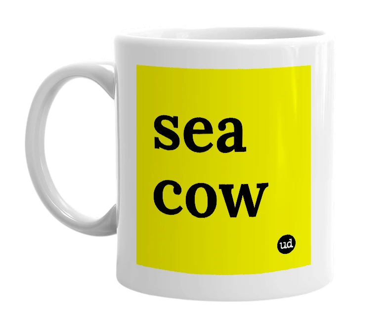 White mug with 'sea cow' in bold black letters