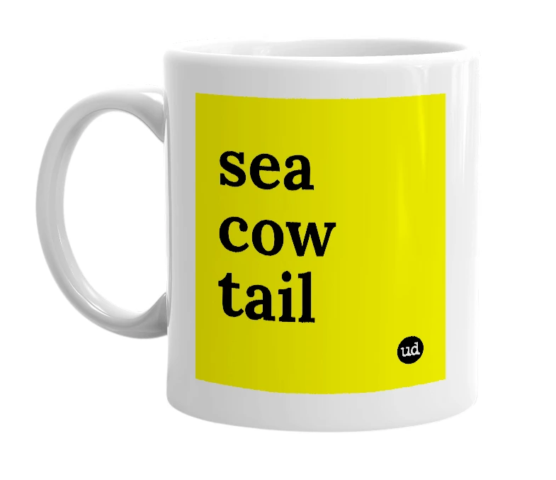 White mug with 'sea cow tail' in bold black letters