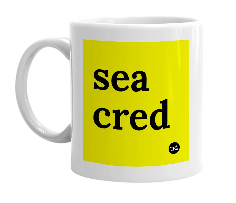 White mug with 'sea cred' in bold black letters