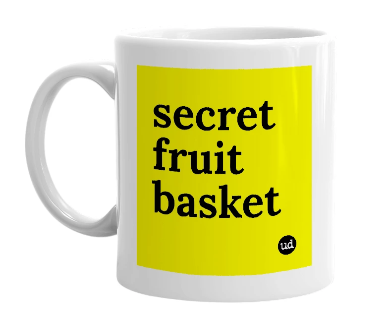 White mug with 'secret fruit basket' in bold black letters