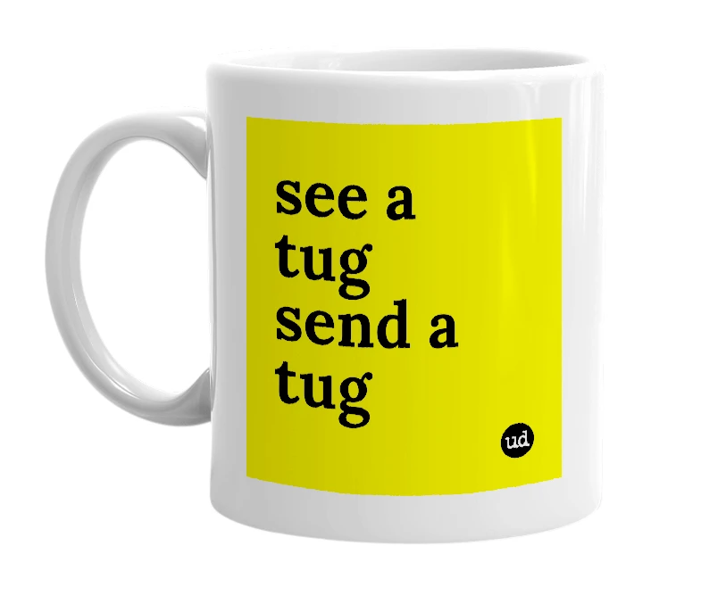 White mug with 'see a tug send a tug' in bold black letters