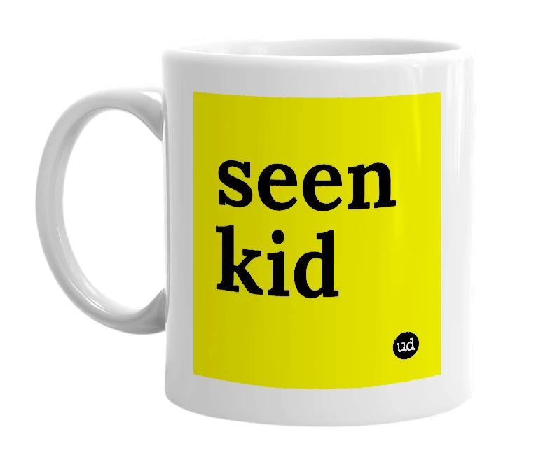 White mug with 'seen kid' in bold black letters