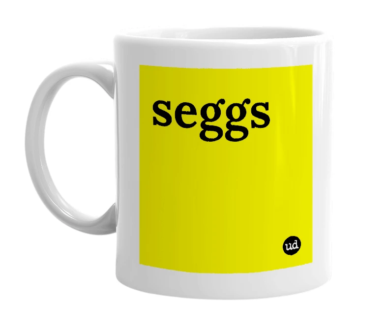 White mug with 'seggs' in bold black letters