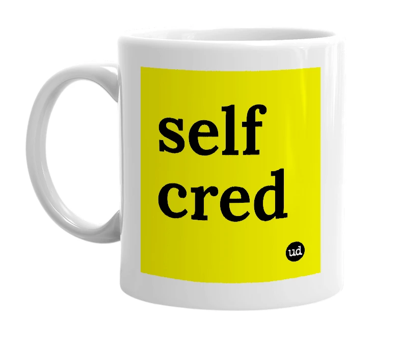 White mug with 'self cred' in bold black letters