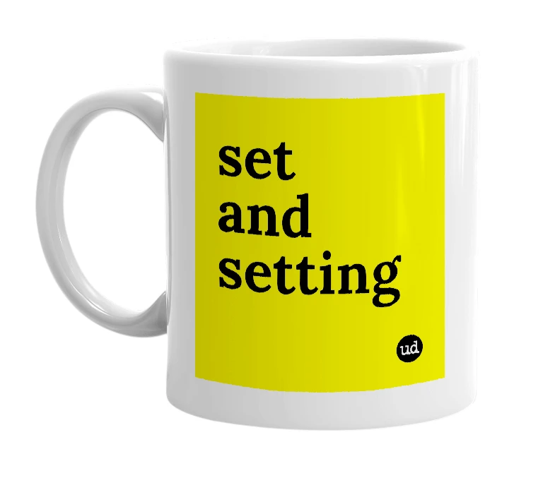 White mug with 'set and setting' in bold black letters