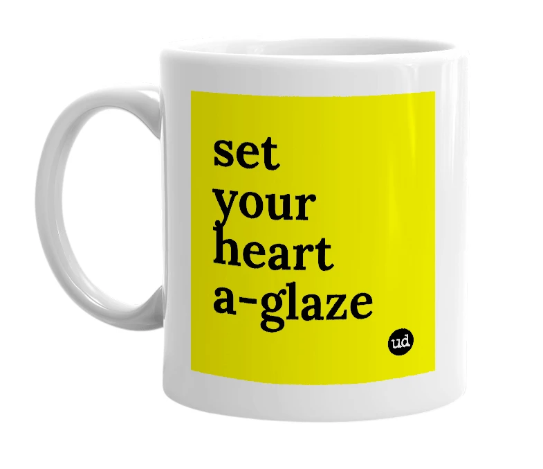White mug with 'set your heart a-glaze' in bold black letters