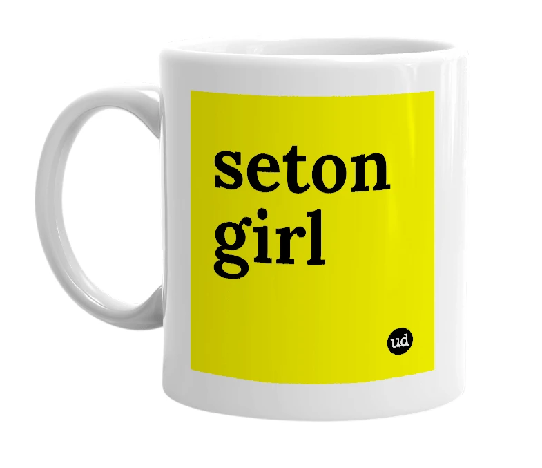 White mug with 'seton girl' in bold black letters