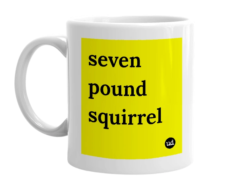 White mug with 'seven pound squirrel' in bold black letters