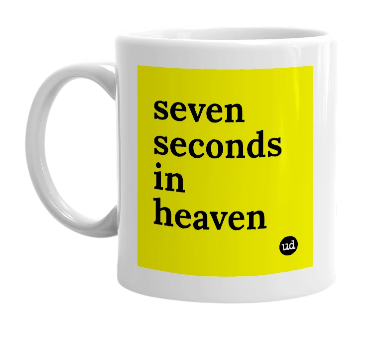 White mug with 'seven seconds in heaven' in bold black letters