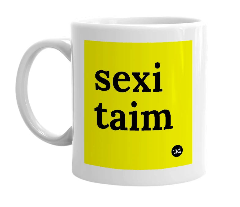 White mug with 'sexi taim' in bold black letters