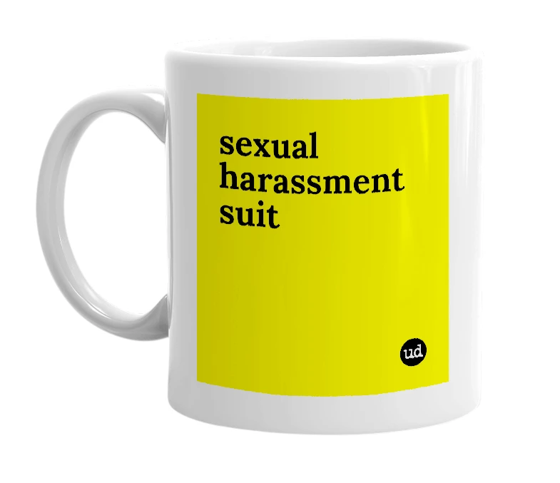 White mug with 'sexual harassment suit' in bold black letters