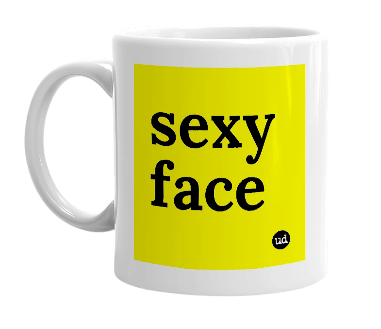 White mug with 'sexy face' in bold black letters