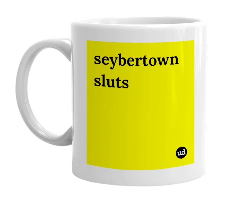 White mug with 'seybertown sluts' in bold black letters