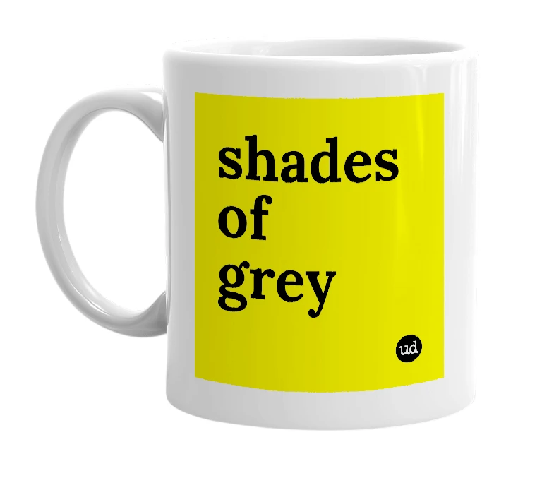 White mug with 'shades of grey' in bold black letters