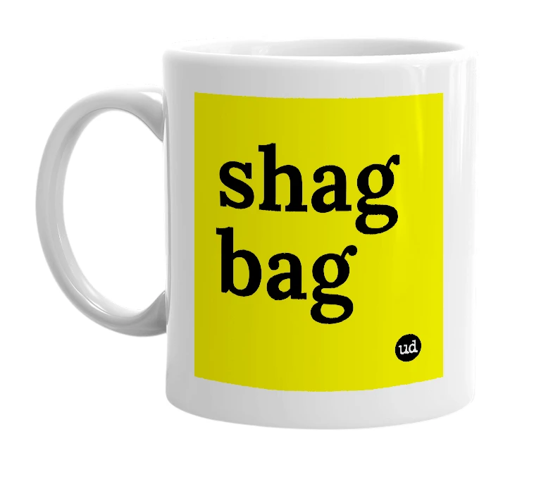 White mug with 'shag bag' in bold black letters