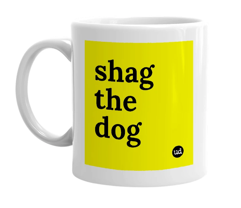 White mug with 'shag the dog' in bold black letters