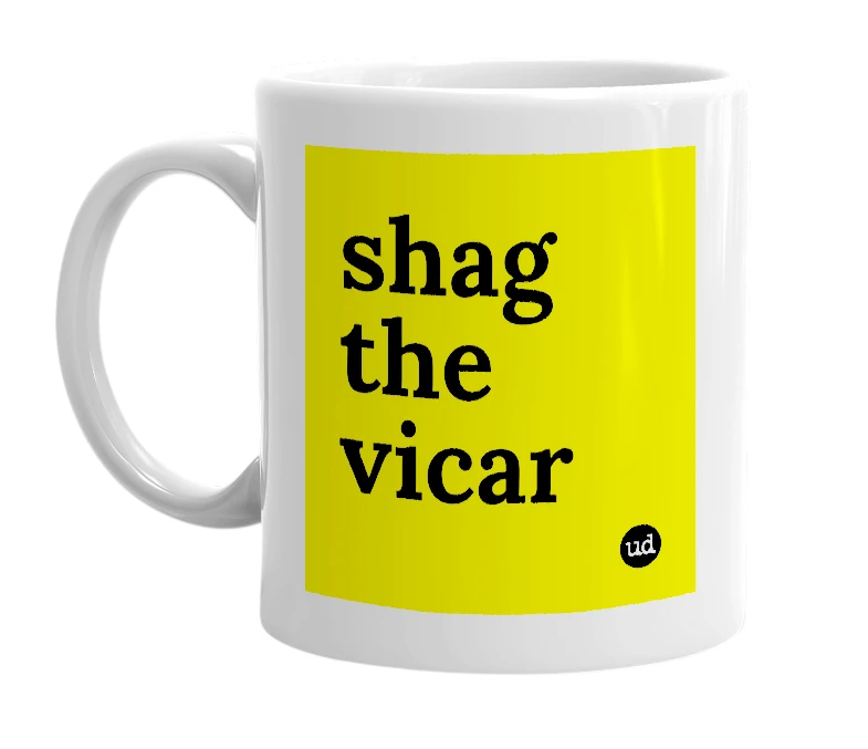 White mug with 'shag the vicar' in bold black letters