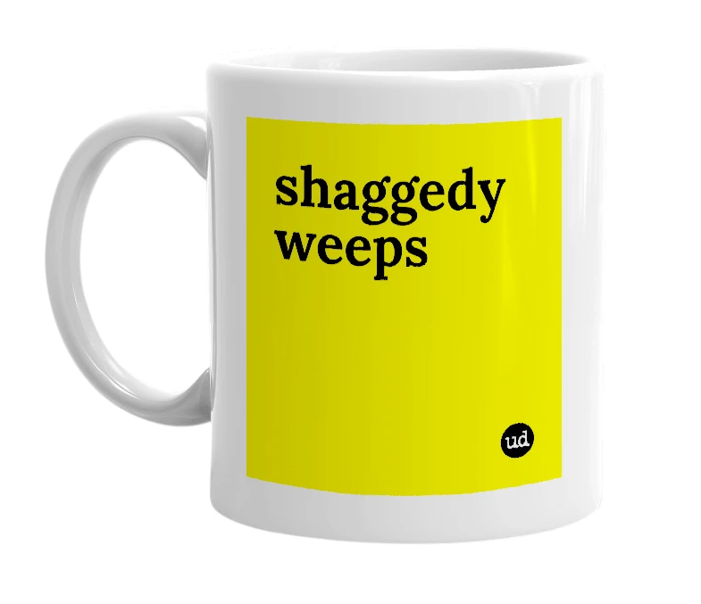 White mug with 'shaggedy weeps' in bold black letters