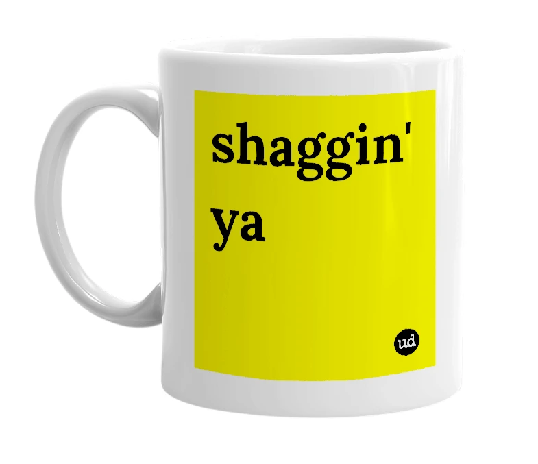 White mug with 'shaggin' ya' in bold black letters
