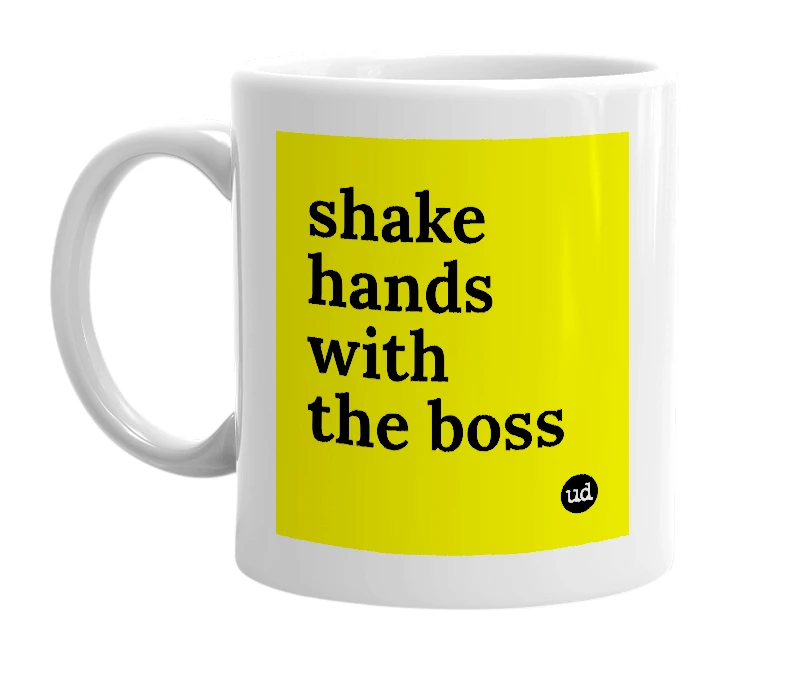 White mug with 'shake hands with the boss' in bold black letters