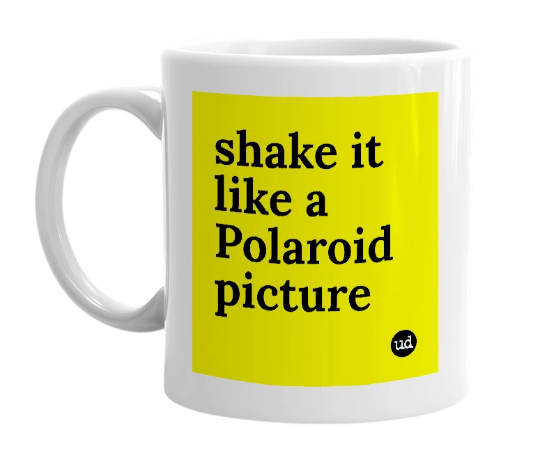 White mug with 'shake it like a Polaroid picture' in bold black letters