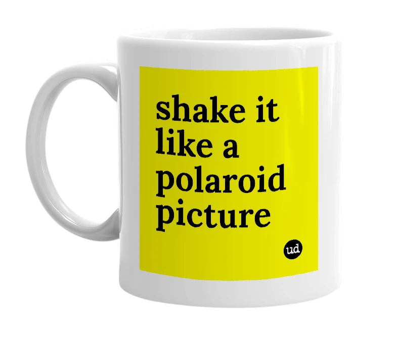 White mug with 'shake it like a polaroid picture' in bold black letters