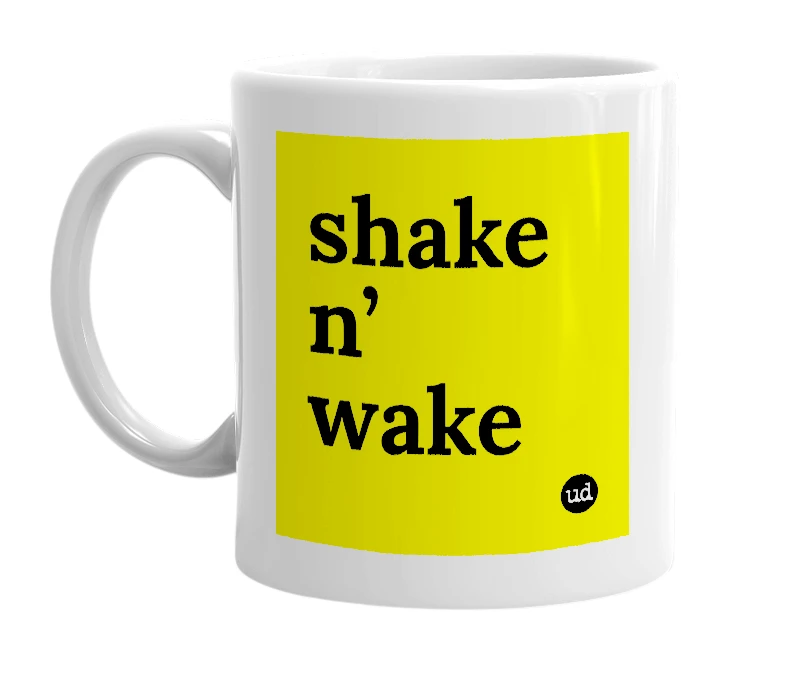 White mug with 'shake n’ wake' in bold black letters