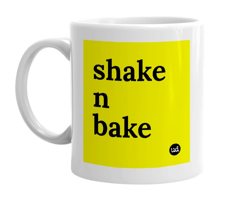 White mug with 'shake n bake' in bold black letters