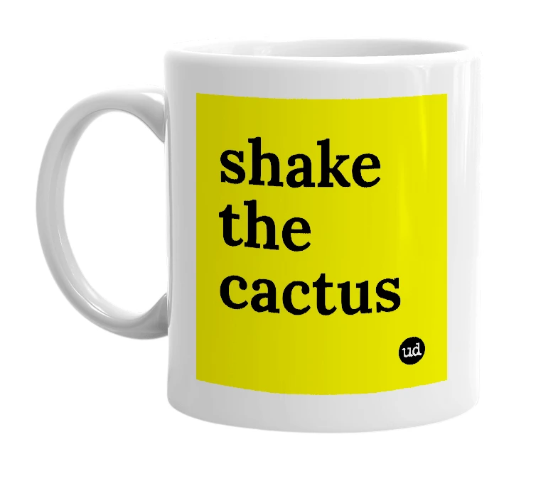 White mug with 'shake the cactus' in bold black letters