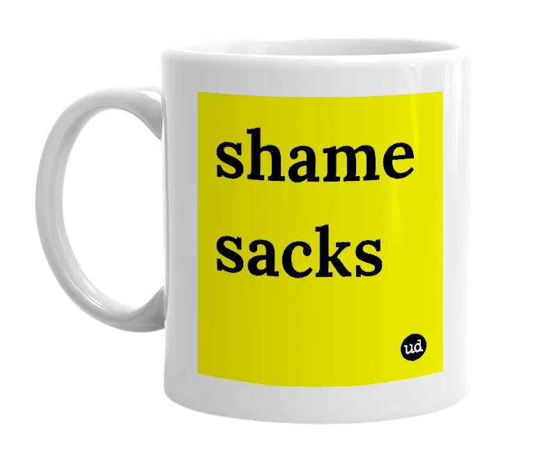 White mug with 'shame sacks' in bold black letters