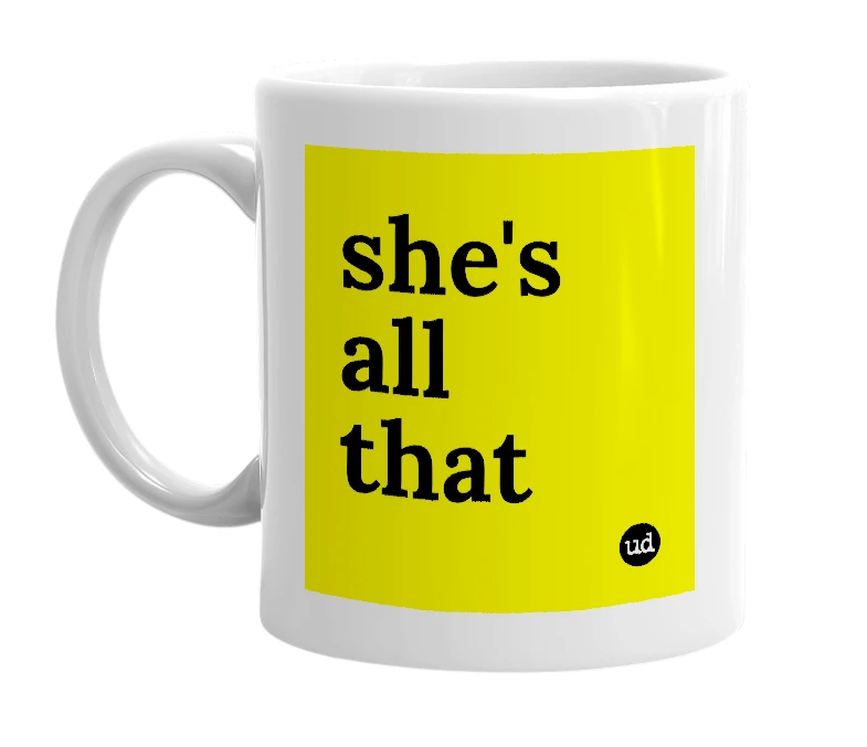 White mug with 'she's all that' in bold black letters