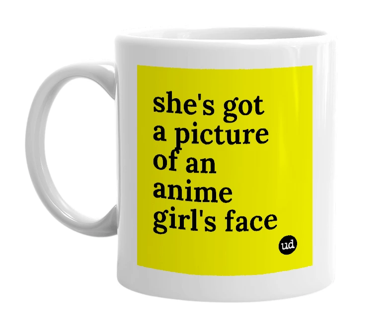 White mug with 'she's got a picture of an anime girl's face' in bold black letters