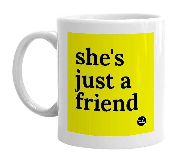 White mug with 'she's just a friend' in bold black letters