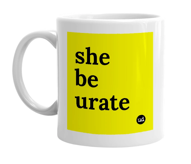 White mug with 'she be urate' in bold black letters