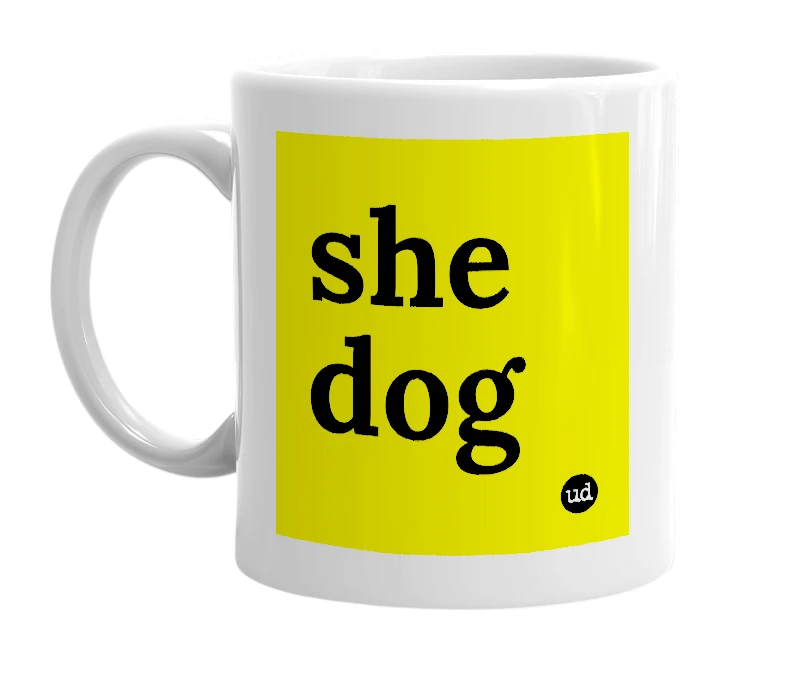 White mug with 'she dog' in bold black letters