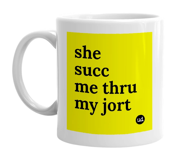 White mug with 'she succ me thru my jort' in bold black letters