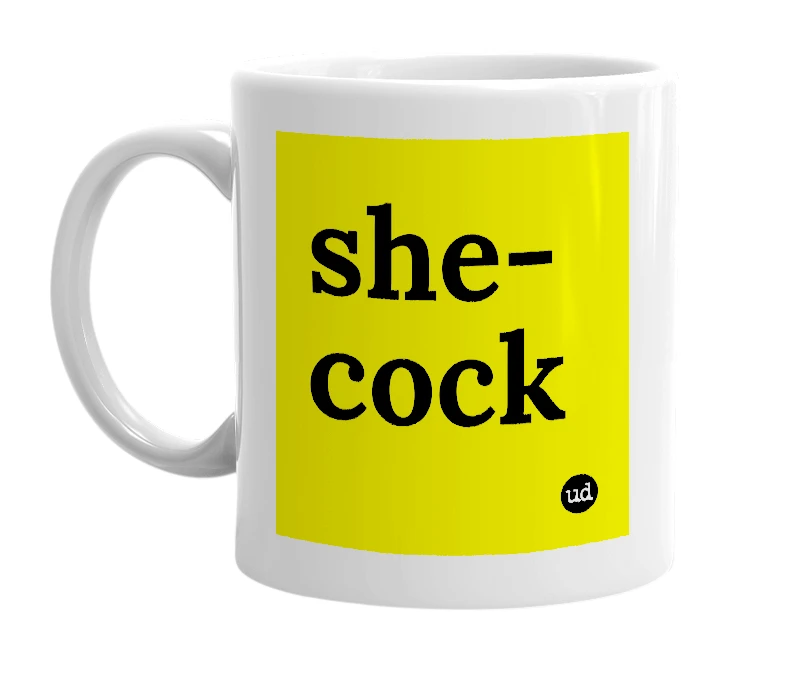 White mug with 'she-cock' in bold black letters