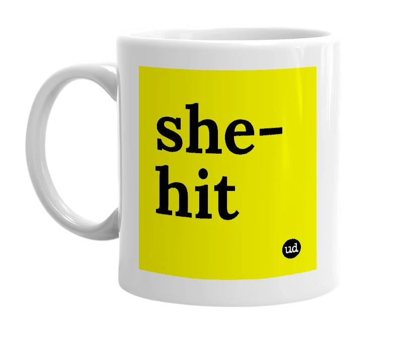 White mug with 'she-hit' in bold black letters