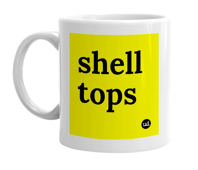 White mug with 'shell tops' in bold black letters