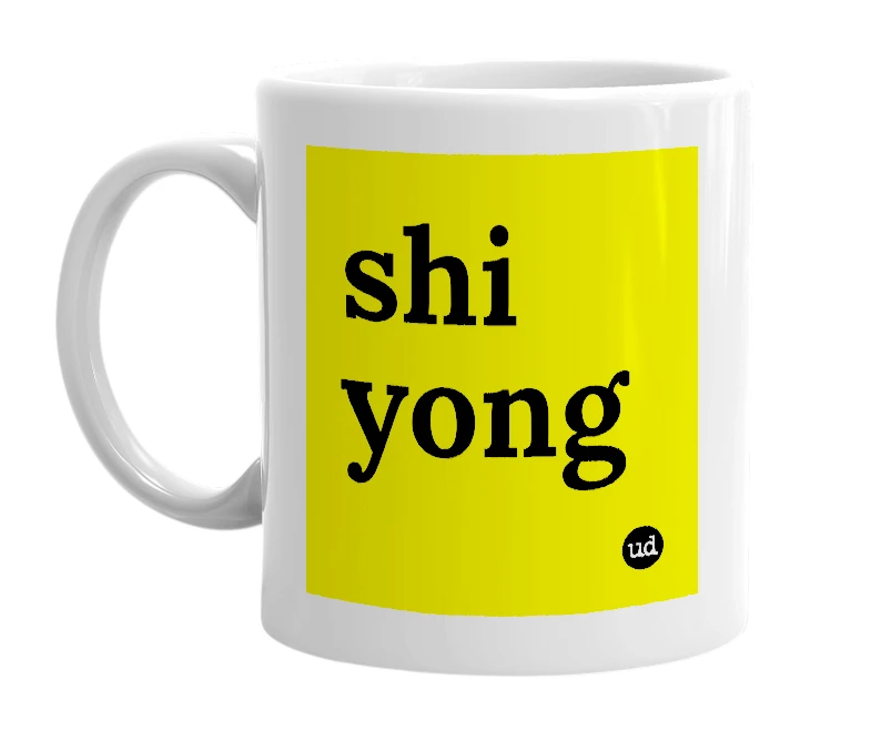 White mug with 'shi yong' in bold black letters