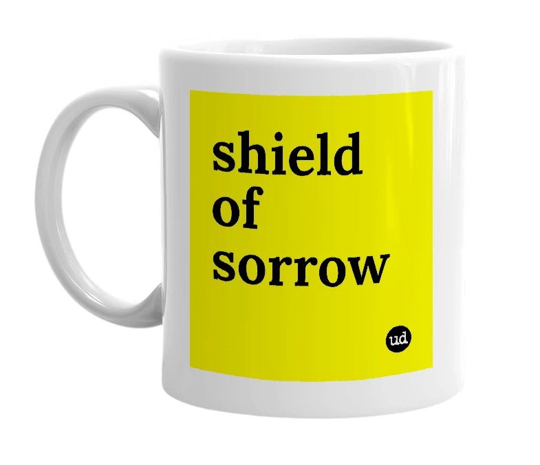 White mug with 'shield of sorrow' in bold black letters