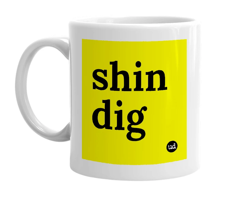 White mug with 'shin dig' in bold black letters