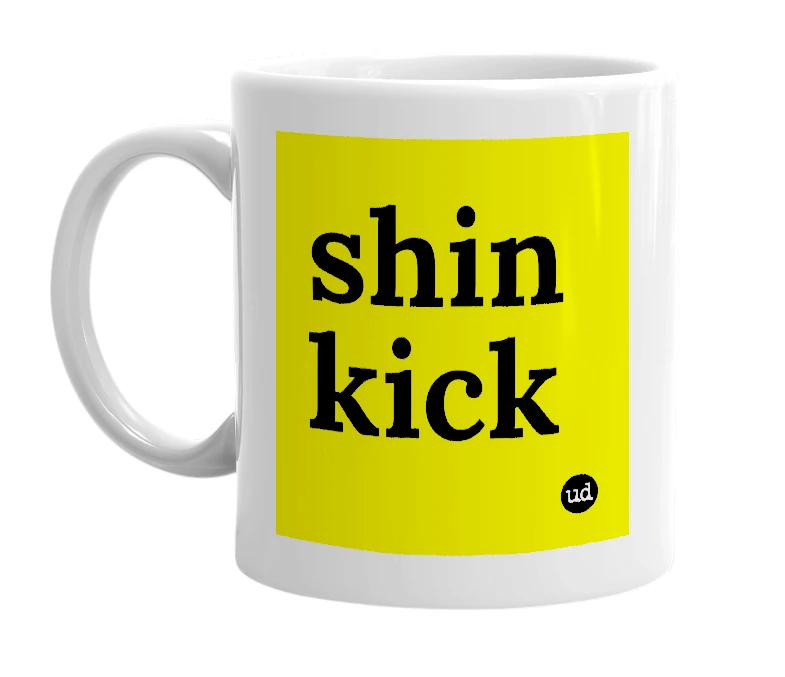 White mug with 'shin kick' in bold black letters