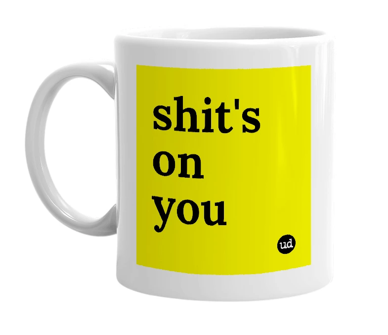 White mug with 'shit's on you' in bold black letters