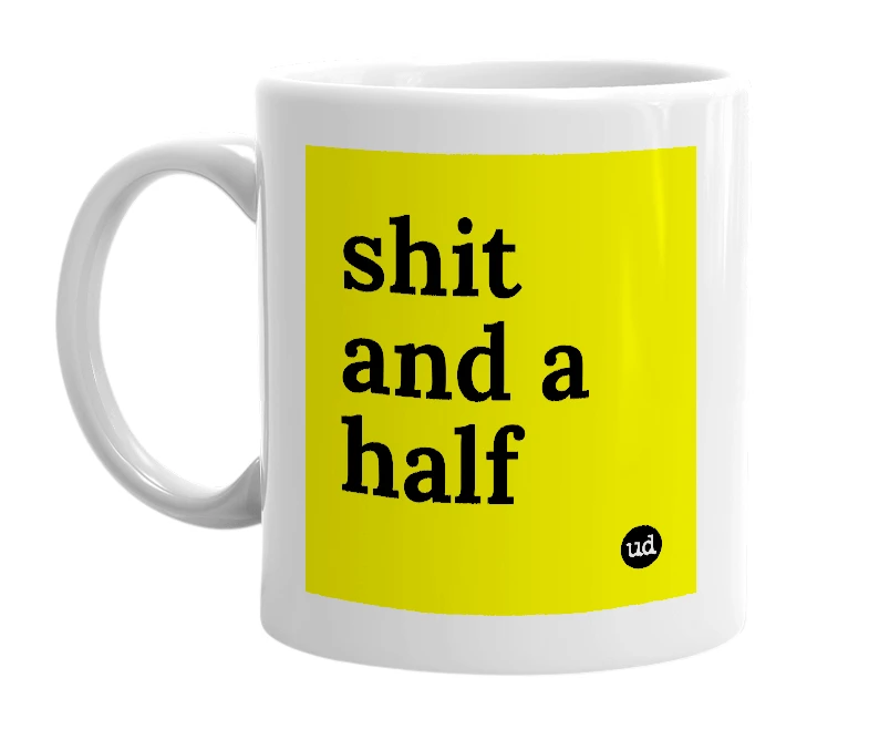 White mug with 'shit and a half' in bold black letters