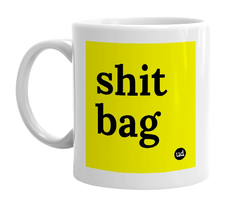 White mug with 'shit bag' in bold black letters