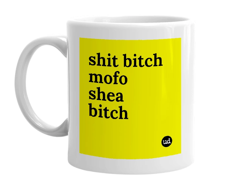 White mug with 'shit bitch mofo shea bitch' in bold black letters