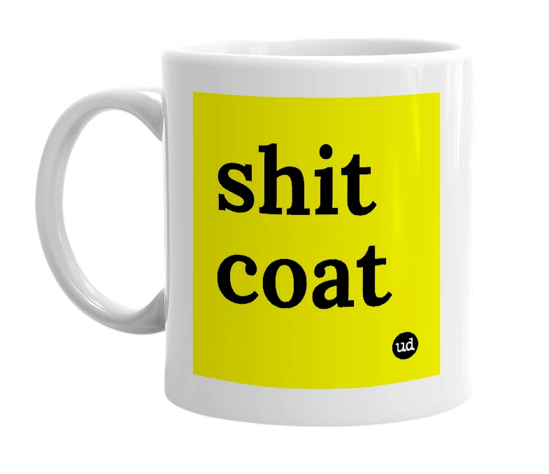 White mug with 'shit coat' in bold black letters