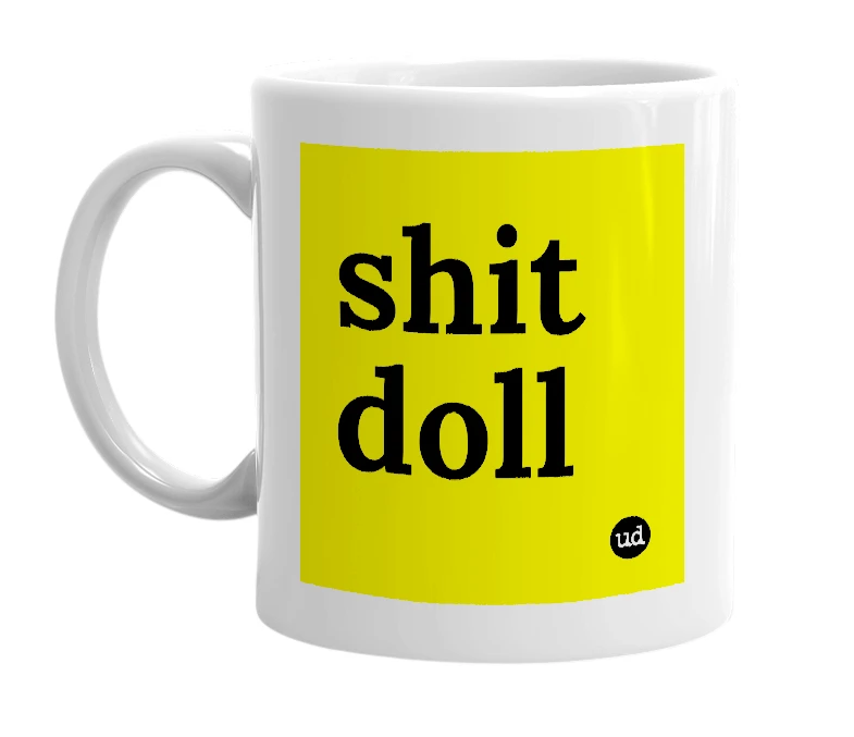 White mug with 'shit doll' in bold black letters