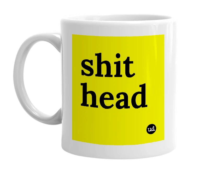 White mug with 'shit head' in bold black letters
